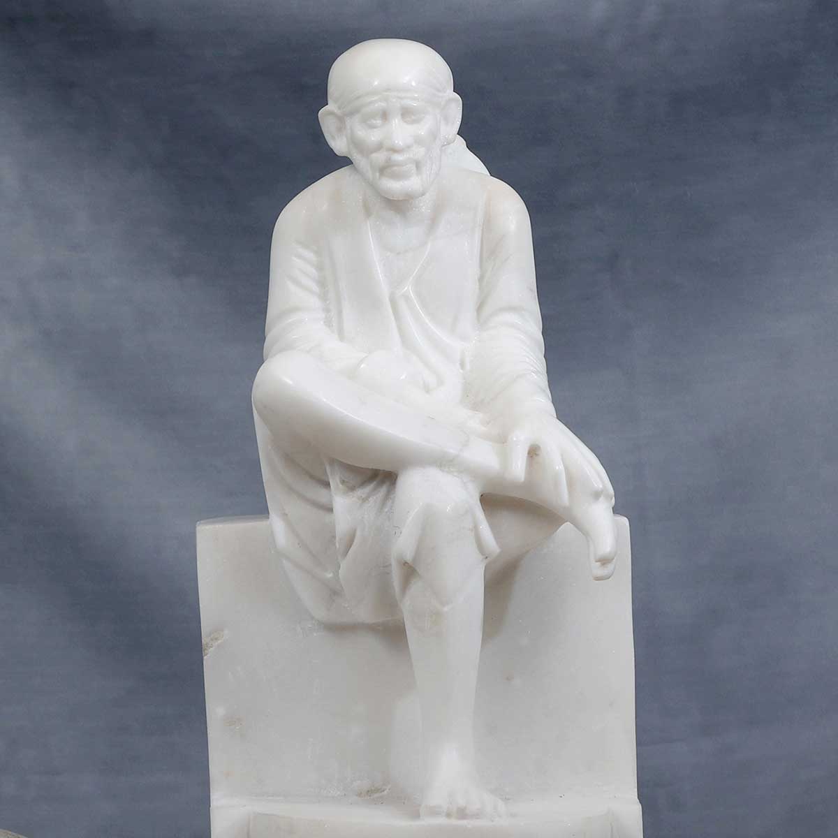 Lord Sai Baba Sitting Idol Made of Marble - 8 x 7 x 16 inch, 27 kg