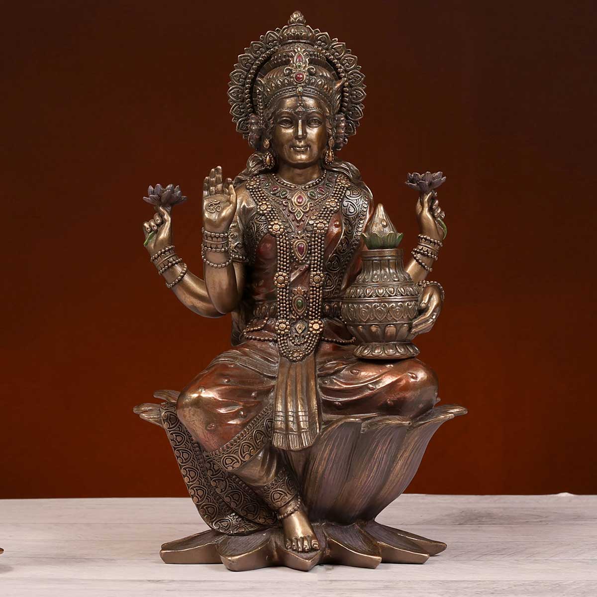 Lord Laxmi Sitting With lotus made of Bronze Composite - 8 x 7.5 x 12.5 Inch, 1.7 Kg